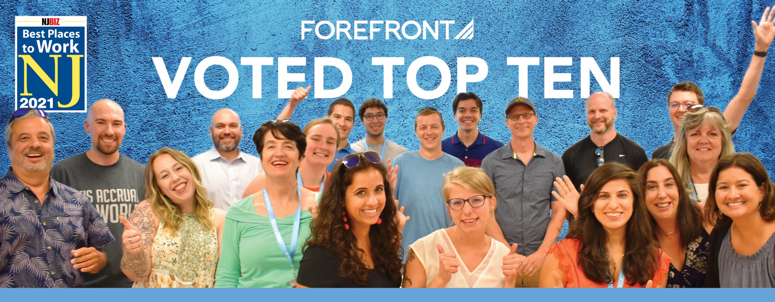 A banner with the text "ForeFront Voted Top Ten" with a badge that reads "Best Places to Work NJ 2021". There is a group photo of smiling people, celebrating the accomplishment.