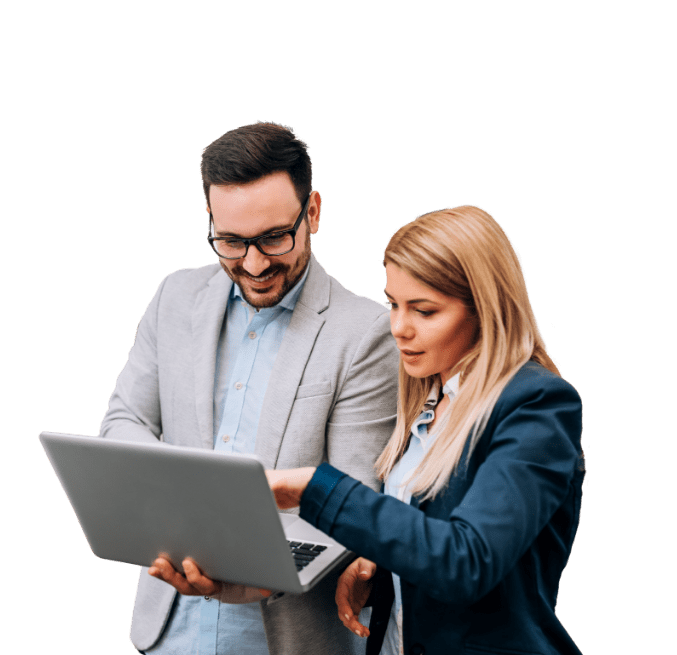 Man and woman looking at laptop.